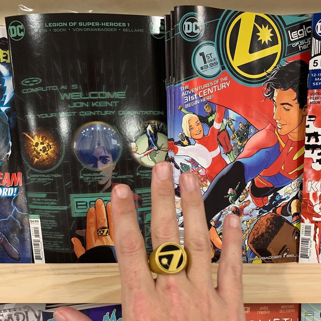 Buy a Legion of Super Heroes book (any vintage), get a Flight Ring. Wearing it facing yourself or an opponent is personal preference. The all new Legion starts now with Jonathan Kent!